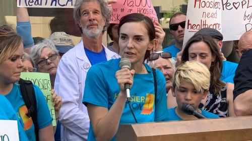 Woman speaking at rally