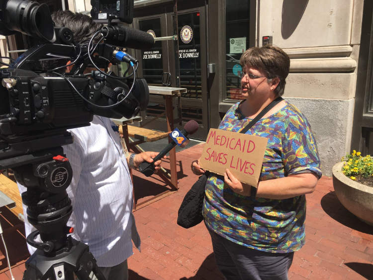 Woman giving a press interview