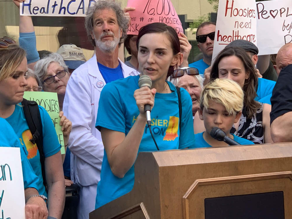 Woman speaking at rally