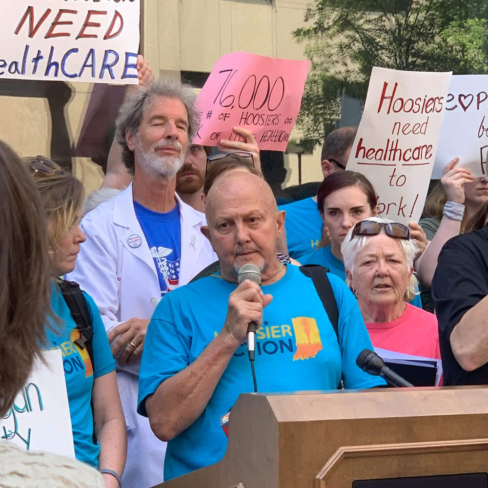 Man speaking at rally